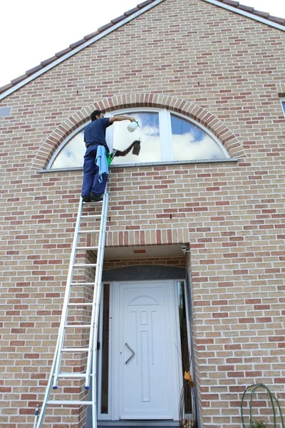 Nettoyage vitre en hauteur